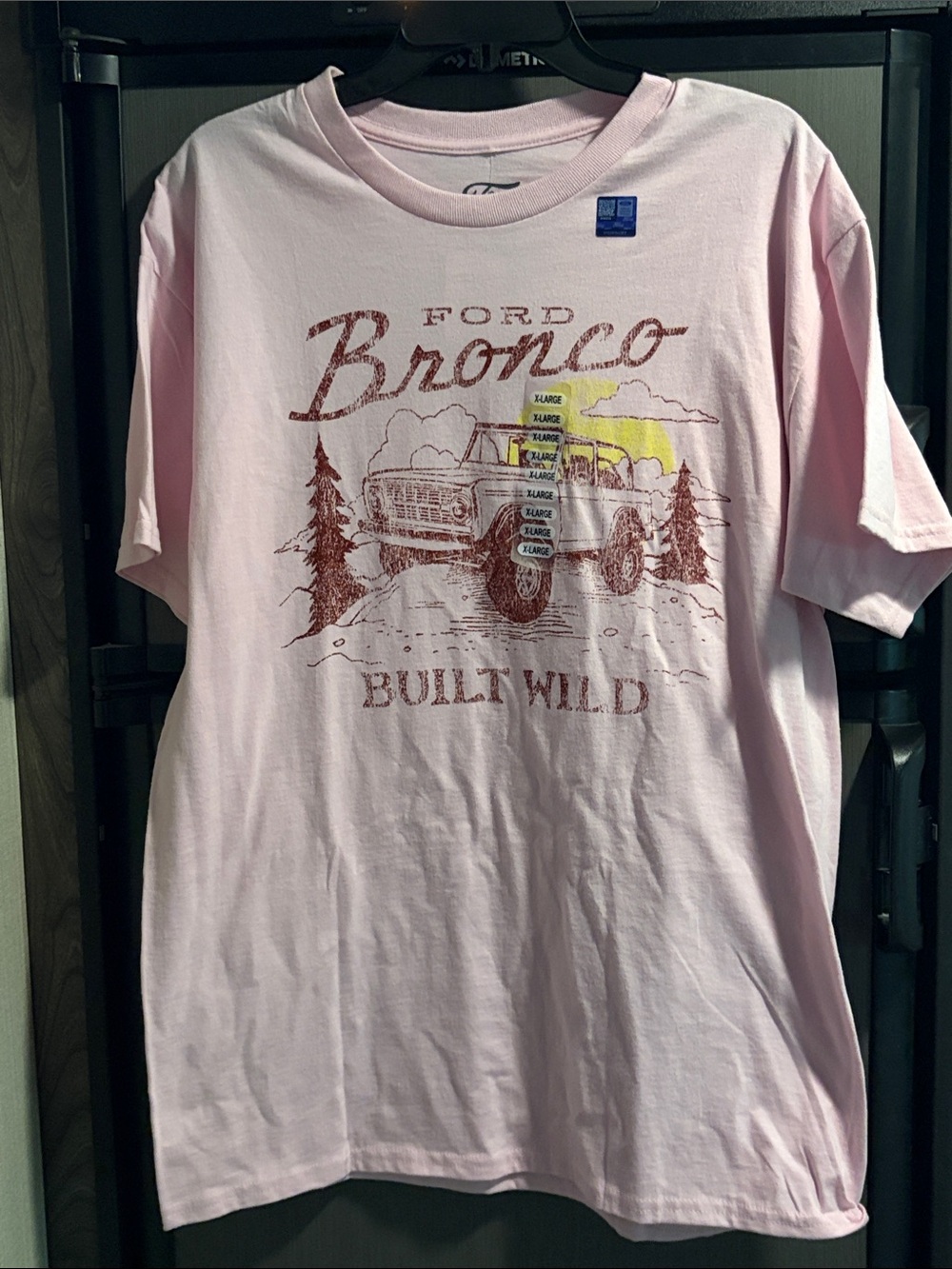 Ford Bronco Built Wild Graphic Tee - Light Pink with Brown & Yellow Print